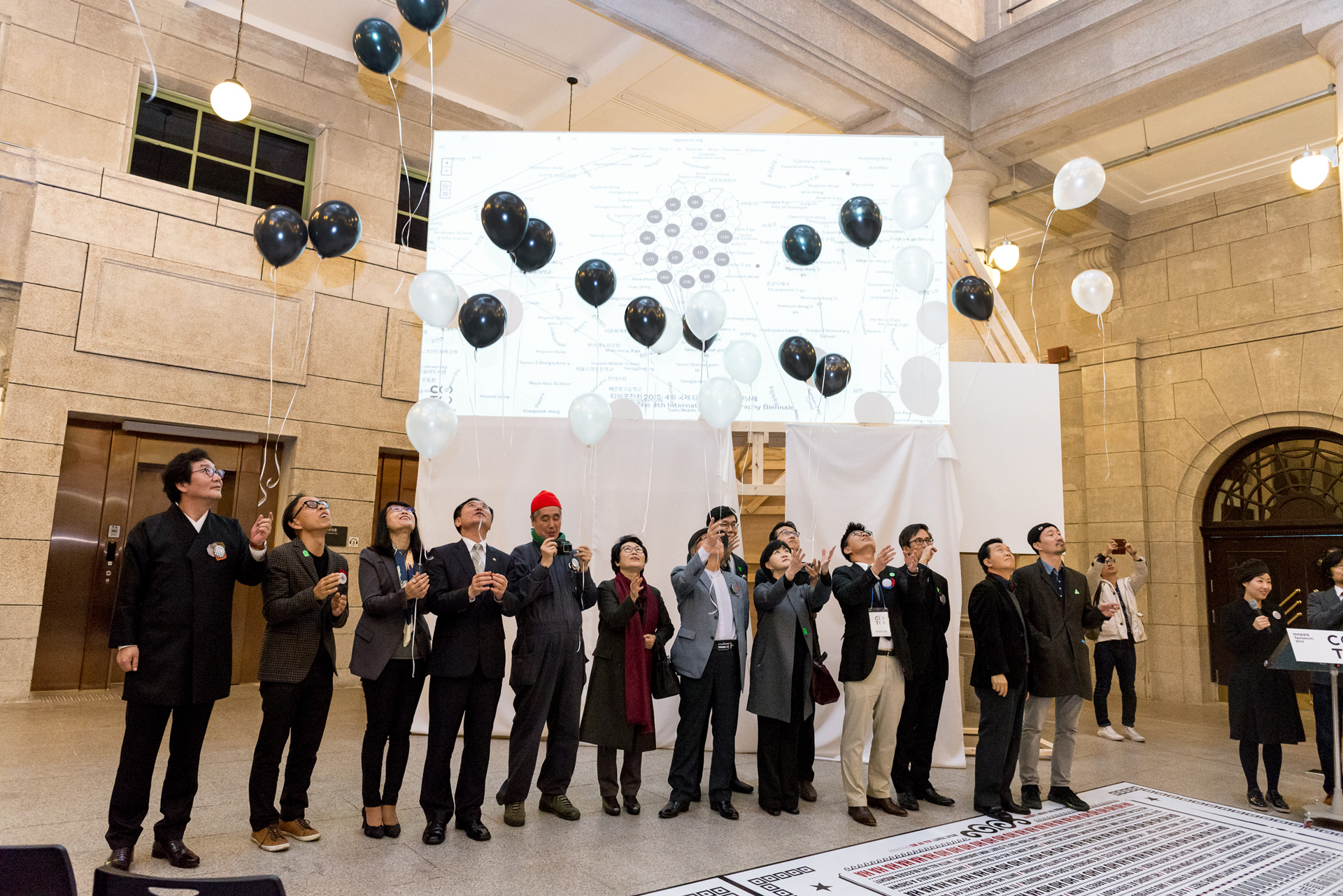 Black and white balloons on biennale’s opening night